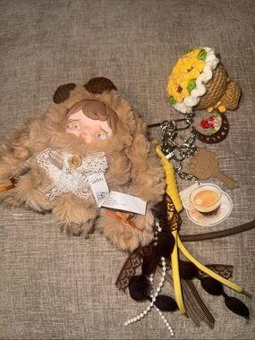 NWT Yomi Plush Bear Keychain with Yellow Crochet Flower Charm scented